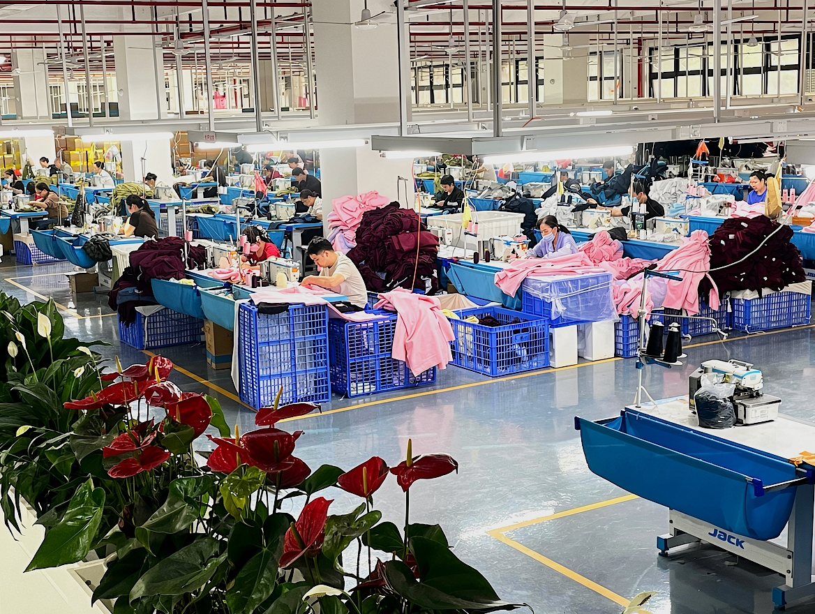 Garment sewing workstations for apparel supply chain production
