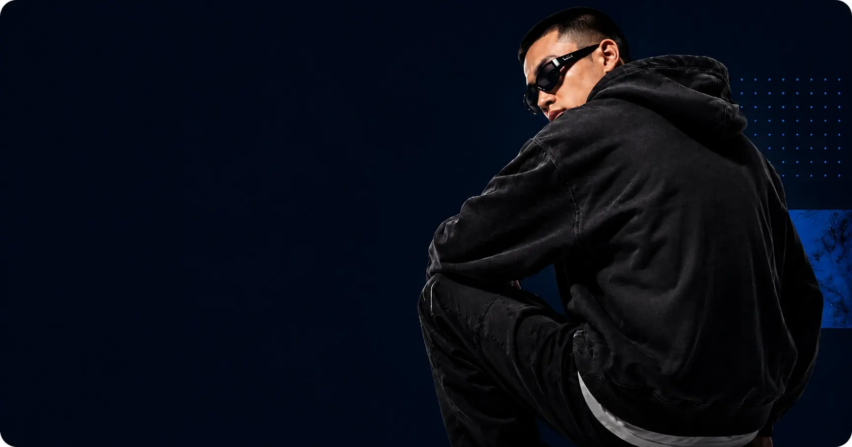 Custom streetwear manufacturer reference showing a black hoodie
