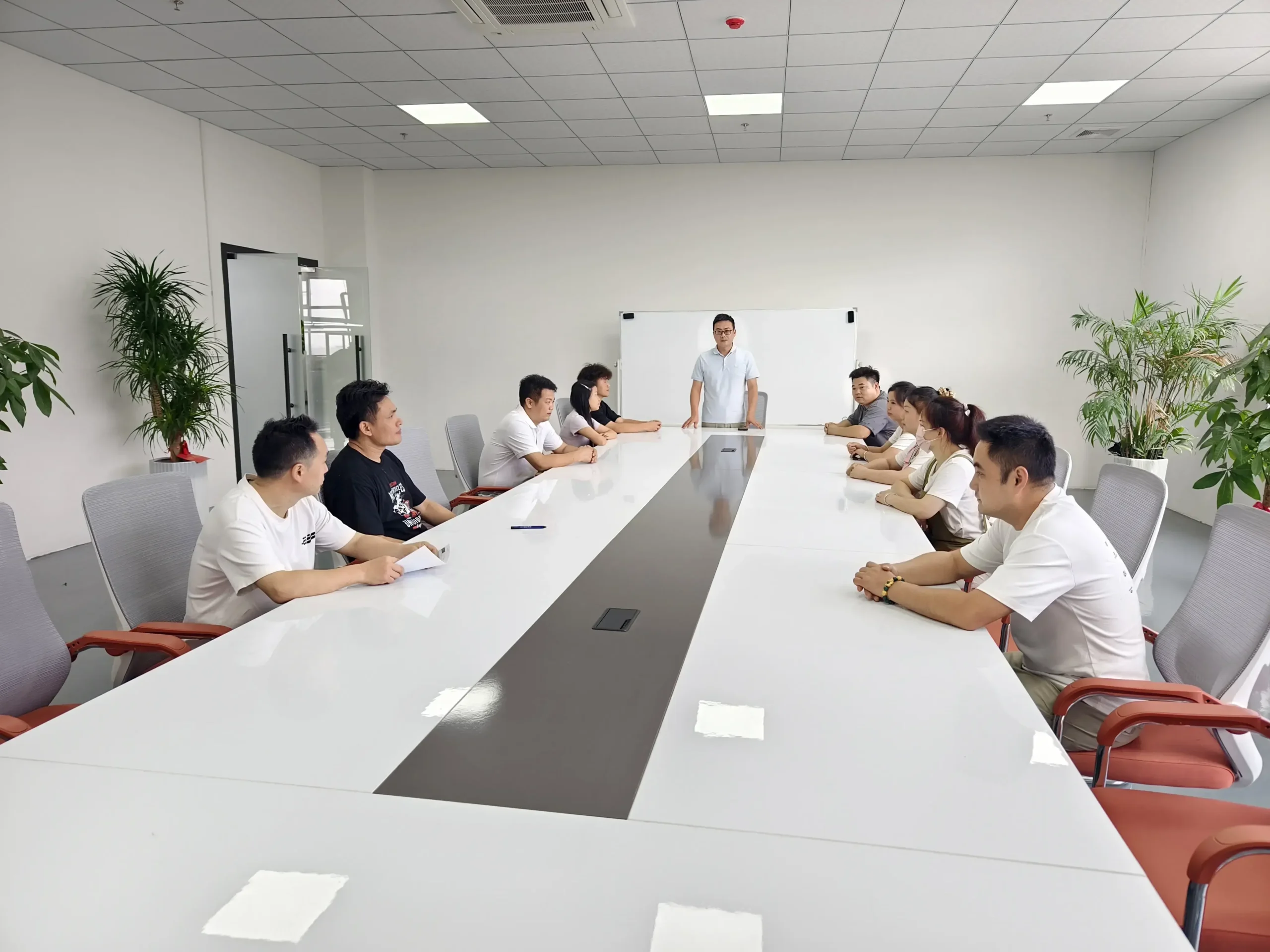 Client conducting facility audit and ODM strategy meeting in Dongguan
